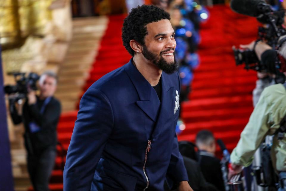 NFL draft prospect Caleb Williams, a quarterback who played at USC and Oklahoma, walks the red carpet for NFL draft day at the Fox Theatre in Detroit on Thursday, April 25, 2024.