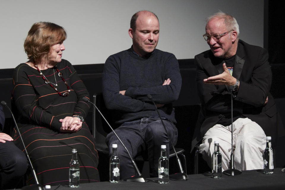 Debbie McWilliams, left, Rory Kinnear and Mark Tildesley on stage at the â€˜In Conversation: 60 Years of James Bondâ€™ event at the BFI Southbank, London, Friday 30th Sept. 2022. (Photo credit Millie Turner/BFI)