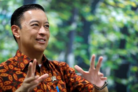 FILE PHOTO: Chief of Indonesia's BKPM Thomas Lembong talks during an interview with Reuters in Jakarta