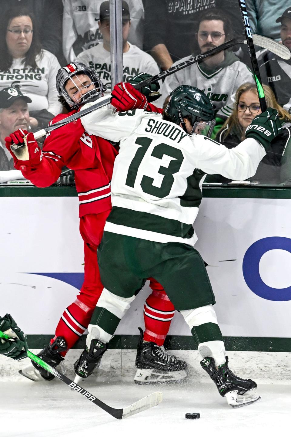 Michigan State's Tiernan Shoudy, right, collides with Ohio State's Patrick Guzzo in the first period of the Big Ten tournament game on Saturday, March 16, 2024, at Munn Arena in East Lansing.