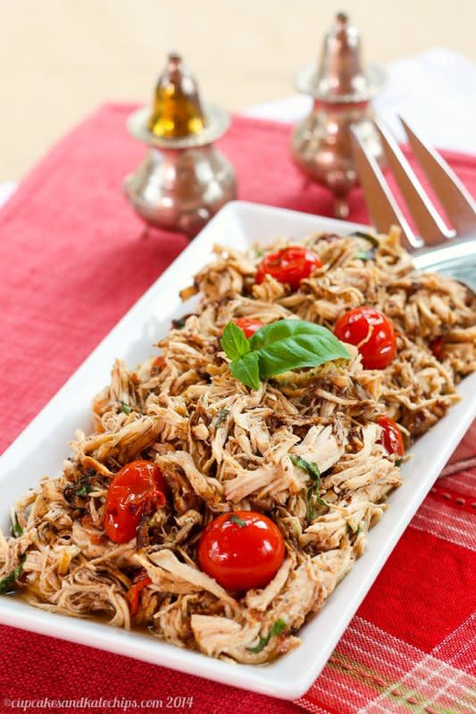<p>Simple, fresh, and flavorful bursting with tomatoes and balasamic vinegar. Get this <a href="https://cupcakesandkalechips.com/slow-cooker-tomato-basil-pulled-chicken/" rel="nofollow noopener" target="_blank" data-ylk="slk:Slow Cooker Tomato Basil Pulled Chicken;elm:context_link;itc:0;sec:content-canvas" class="link rapid-noclick-resp">Slow Cooker Tomato Basil Pulled Chicken</a> recipe!</p>
