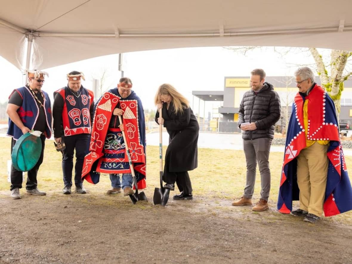 A ground breaking ceremony took place at the site of the future Starbucks store near the town of Campbell River on Vancouver Island. The new Starbucks will provide the We Wai Kai Nation an opportunity to create a self-reliant economy, said Chief Ronnie Chickite (pictured third from left). (Eric Kular - image credit)