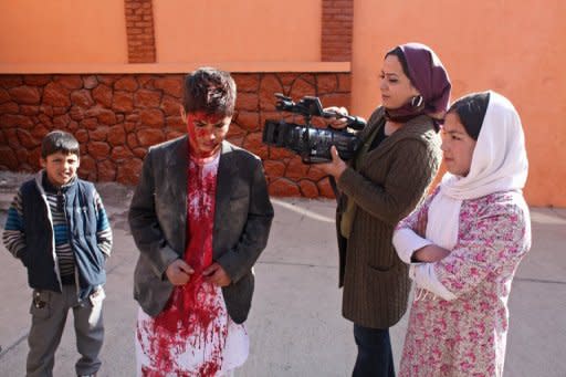 A camerawoman from the "Kabul I Love You" crew films in Kabul. Forced marriage, people smuggling, illegal land grabs, land mines and ethnic conflict -- life in Kabul is not short of problems, and "Kabul I Love You" explores them through 10 interwoven stories