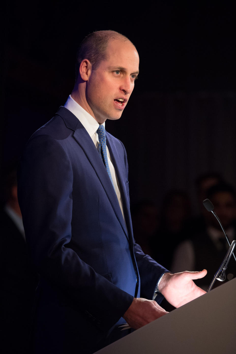 Prince William chose to compliment his wife in a bold blue suit [Photo: PA Images]