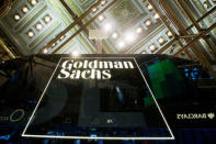 FILE PHOTO - A Goldman Sachs sign is seen above the floor of the New York Stock Exchange shortly after the opening bell in the Manhattan borough of New York, U.S. on January 24, 2014. REUTERS/Lucas Jackson/File Photo