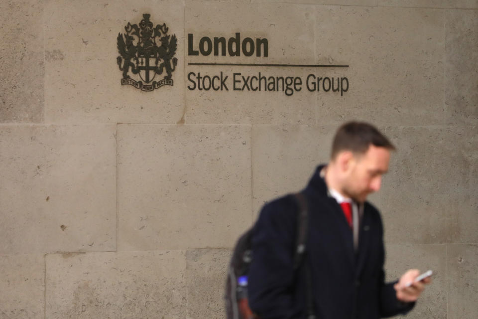 LONDON, March 9, 2020 -- A man stands outside the London Stock Exchange in London, Britain, on March 9, 2020. British stocks decreased on Monday, with the benchmark FTSE 100 Index down by 7.69 percent, or 496.78 points, to close at 5,965.77 points. (Photo by Tim Ireland/Xinhua via Getty) (Xinhua/ via Getty Images)