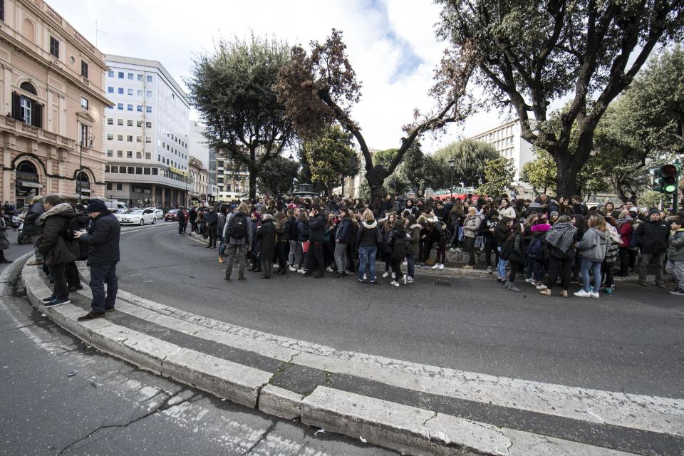 Students and teachers stand outside a highschool after it was evacuated following three earthquakes which hit central Italy in the space of an hour, shaking the same region that suffered a series of deadly quakes last year, in Rome, Wednesday, Jan. 18, 2017. (Massimo Percossi/ANSA via AP)