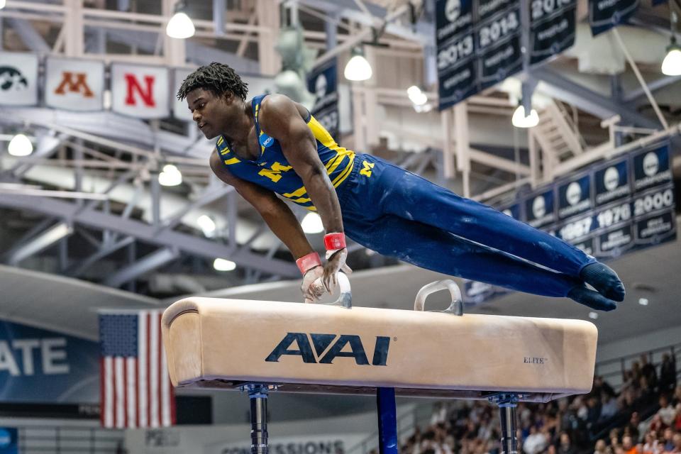 Stoughton's Frederick Richard competes as the University of Michigan men's gymnastics team earned second place in NCAA Tournament at Rec Hall in State College, Pennsylvania, on April 15, 2023.