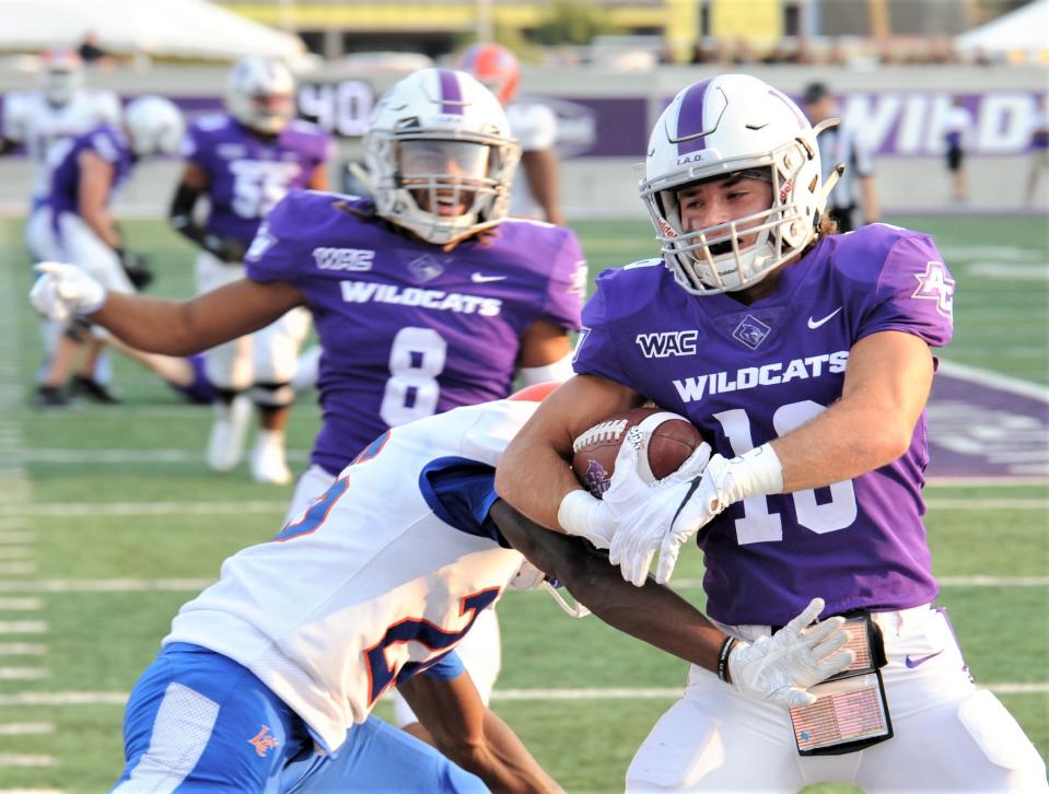 ACU's Denver Holman scores on a 14-yard TD pass from Stone Earle in the first quarter against Louisiana College on Sept. 11, 2021 at Wildcat Stadium.