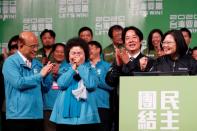 Premier Su Tseng-chang, Presidential Office Secretary-General Chen Chu, Vice President-elect William Lai, incumbent Taiwan President Tsai Ing-wen celebrate at a rally after their election victory in Taipei