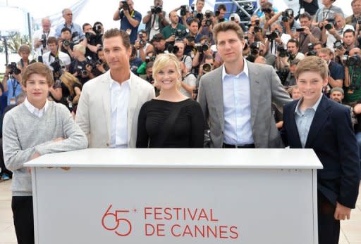 (From L) US actors Tye Sheridan, Matthew McConaughey and Reese Witherspoon, director Jeff Nichols and actor Jacob Lofland pose during the photocall of their film "Mud" presented in competition at the 65th Cannes film festival. Cannes moored up on the Mississippi on Saturday with "Mud", a Huckleberry Finn-like tale about two boys, a fugitive, and the search for true love that wrapped up the race