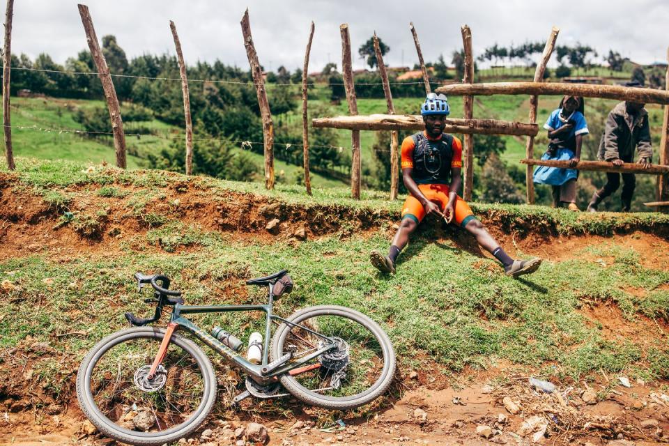 cyclist john kariuki taking a break during a training ride in iten kenya