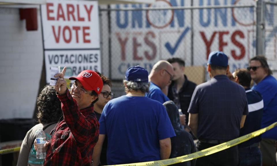 People wait in line to vote early at the Culinary Workers union in Las Vegas on Monday.