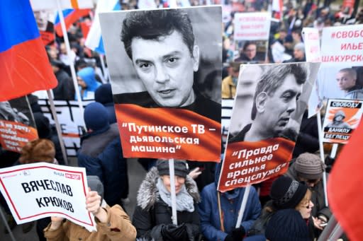 Opposition supporters attend a march in memory of murdered Kremlin critic Boris Nemtsov in downtown Moscow. It is the first such rally since Russia's Vladimir Putin announced controversial changes to the constitution in January