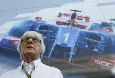 Formula One commercial supremo Bernie Ecclestone arrives for the drivers' parade before the first Russian Grand Prix in Sochi October 12, 2014. REUTERS/Maxim Shemetov