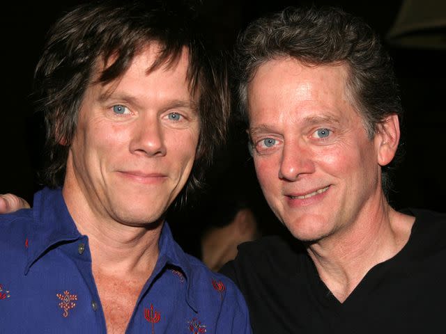 <p>Bruce Glikas/FilmMagic</p> Kevin Bacon and his brother Michael Bacon pose for a photo together.