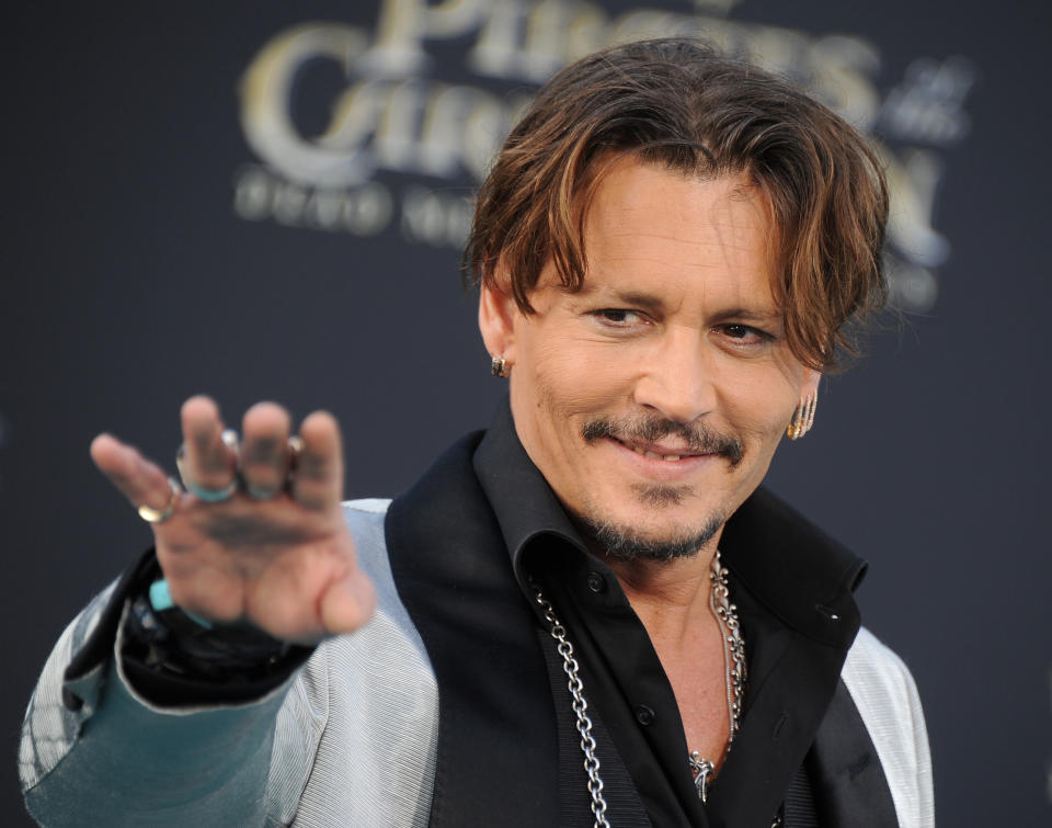 HOLLYWOOD, CA - MAY 18:  Actor Johnny Depp arrives at the premiere of Disney's 