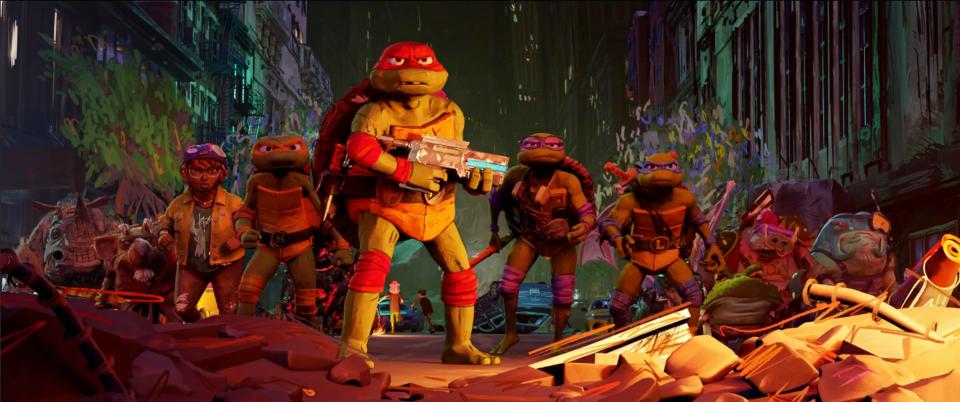 Raph (voiced by Brady Noon, center) stands tall against Superfly alongside human pal April O'Neil (Ayo Edebiri) and his turtle bros Mikey (Shamon Brown Jr.), Donnie (Micah Abbey) and Leo (Nicolas Cantu) in "Teenage Mutant Ninja Turtles: Mutant Mayhem."