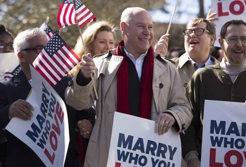 From left: Robert Roman and Claus Ihlemann of Virginia Beach celebrate with Carol Schall, Mary Townley , Tim Bostic and Tony London, Thursday's ruling by federal Judge Arenda Wright Allen that Virginia's same-sex marriage ban was unconstitutional during a news conference, Friday, Feb. 14, 2014 in Norfolk, Va. Wright Allen on Thursday issued a stay of her order while it is appealed, meaning that gay couples in Virginia still won’t be able to marry until the case is ultimately resolved. An appeal will be filed to the 4th District Court of Appeals, which could uphold the ban or side with Wright Allen. (AP Photo/The Virginian-Pilot, Bill Tiernan) MAGS OUT