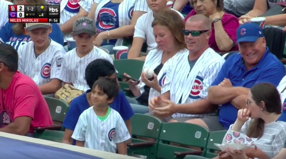 The internet branded this guy a villain for appearing to steal a baseball from a kid, but there’s more to the story than the video showed. (Screengrab via MLB)