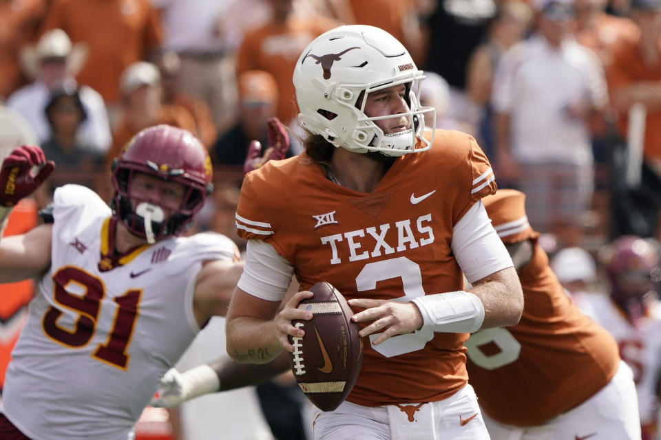 Texas quarterback Quinn Ewers (3) looks to pass against Iowa State during the first half of an NCAA college football game, Saturday, Oct. 15, 2022, in Austin, Texas. (AP Photo/Eric Gay)