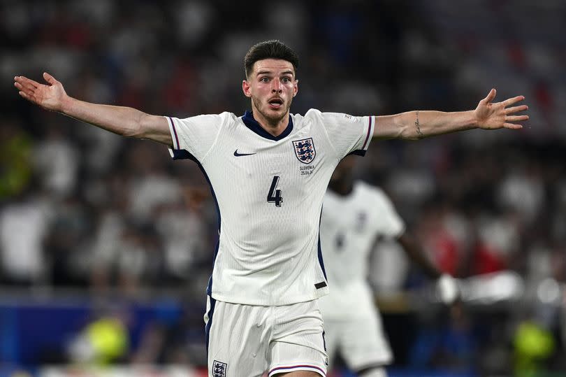 Declan Rice of England reacts during the UEFA EURO 2024 group stage match between England and Slovenia at Cologne Stadium on June 25, 2024 in Cologne, Germany