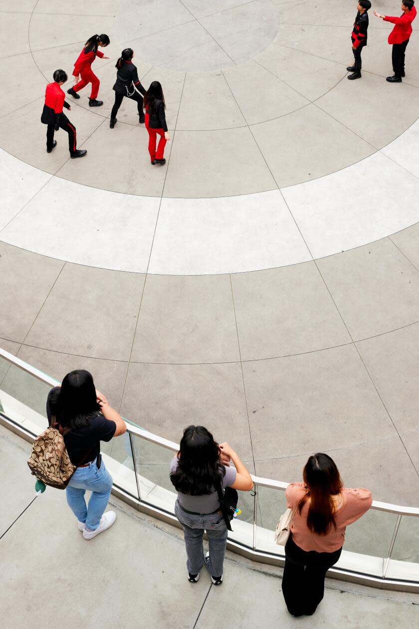 Dance crews will often practice K-pop dance routines in the open courtyard of the Source OC.