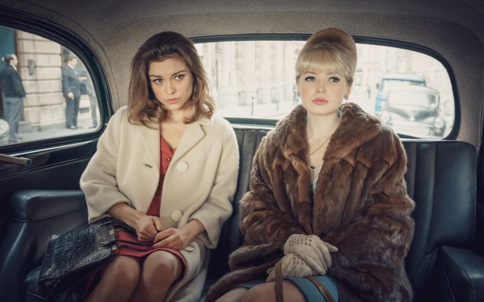 Ellie Bamber as Mandy Rice-Davies and Sophie Cookson as Christine Keeler in The Trial of Christine Keeler - BBC/Ben Blackall 