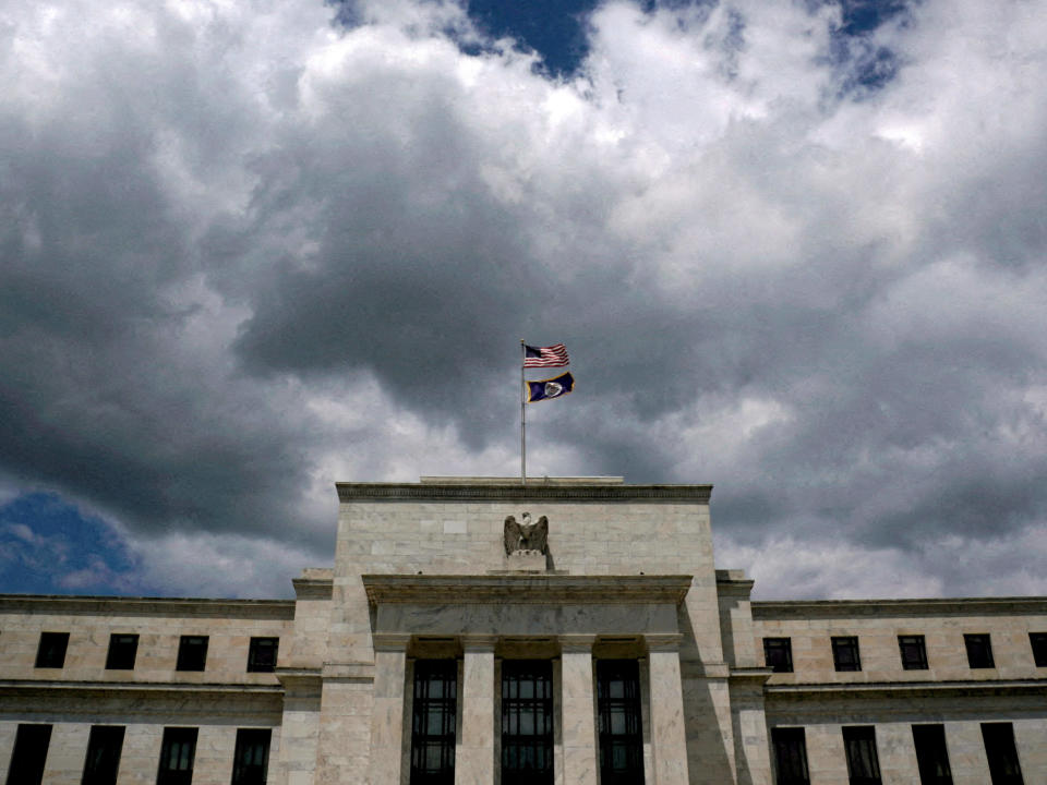 FTSE PHOTO: Flags fly over the Federal Reserve building on a windy day in Washington, U.S., May 26, 2017. REUTERS/Kevin Lamarque/File Photo