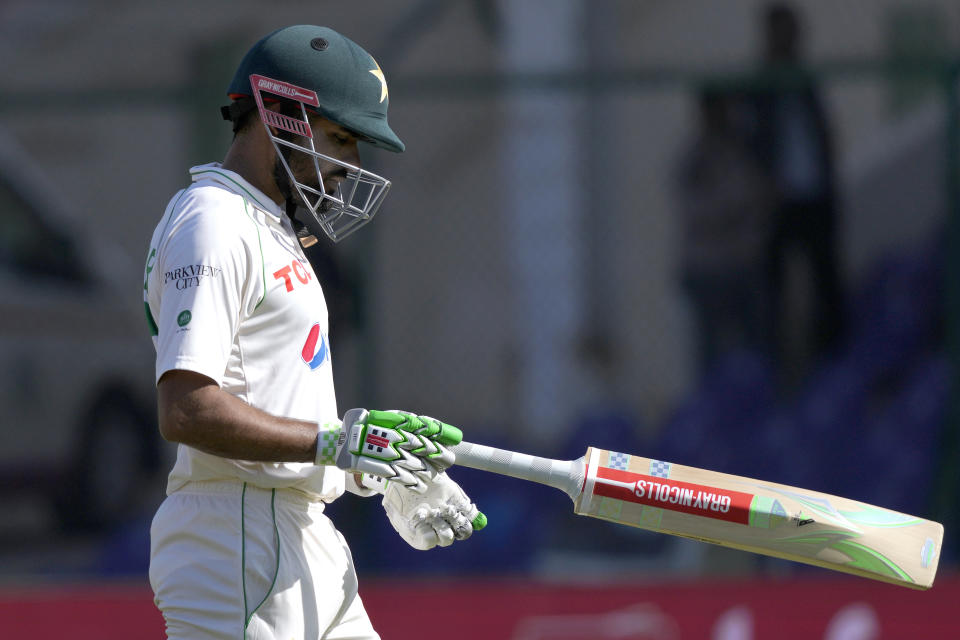 Pakistan's Babar Azam reacts as he walks off the field after his dismissal during the fifty day of first test cricket match between Pakistan and New Zealand, in Karachi, Pakistan, Friday, Dec. 30, 2022. (AP Photo/Fareed Khan)