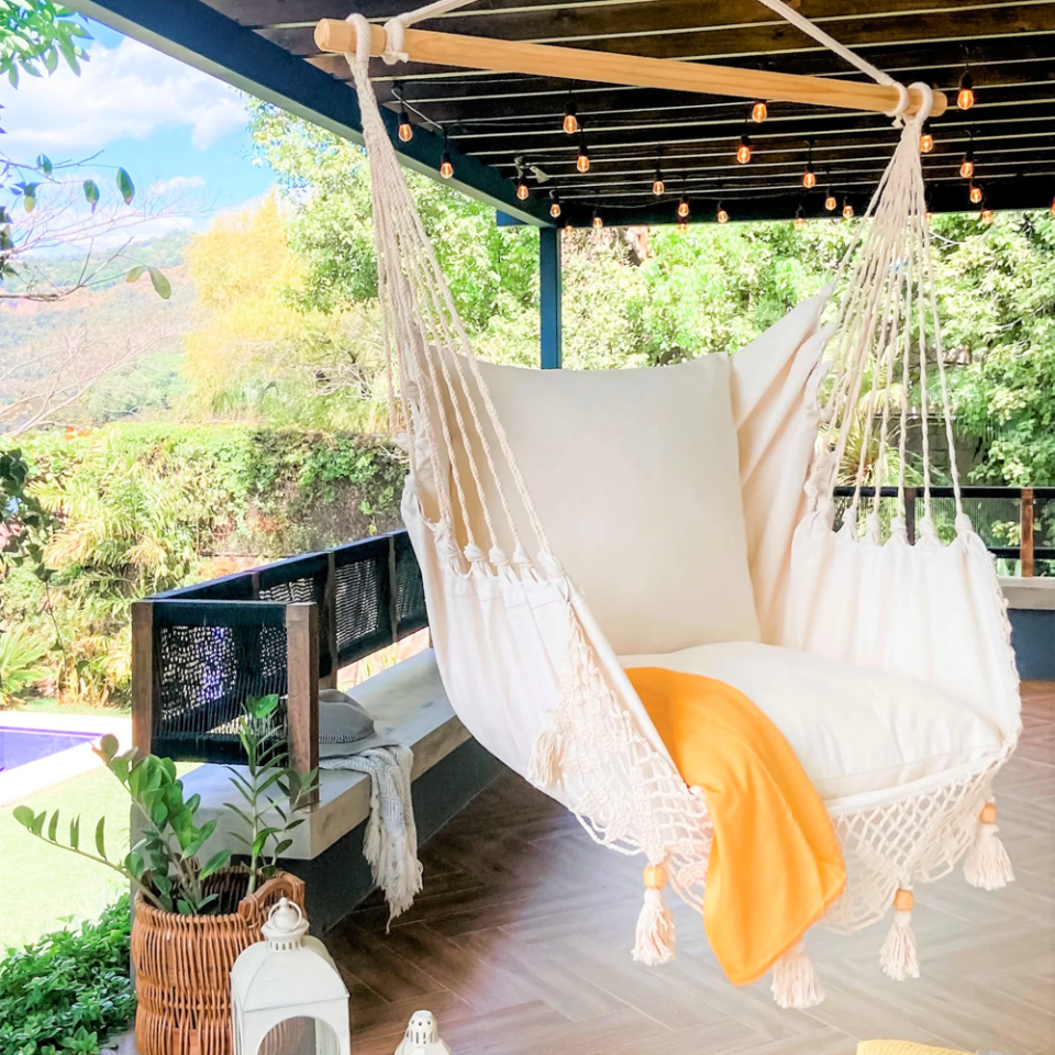 <p><a href="https://go.redirectingat.com?id=74968X1596630&url=https%3A%2F%2Fwww.etsy.com%2Flisting%2F801341553%2Fhammock-chair-hanging-chair-swing-chair&sref=https%3A%2F%2Fwww.cosmopolitan.com%2Flifestyle%2Fg40151815%2Fbest-outdoor-hanging-chairs%2F" rel="nofollow noopener" target="_blank" data-ylk="slk:Shop Now;elm:context_link;itc:0;sec:content-canvas" class="link ">Shop Now</a></p><p>LimboImports Hanging Chair</p><p>$179.99</p><p>etsy.com</p>