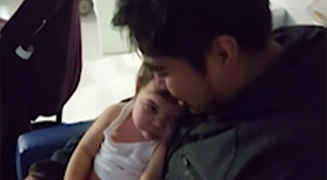 John Adolfo with Zahlia. Her parents waited by her bedside for seven weeks. Source: 7 News