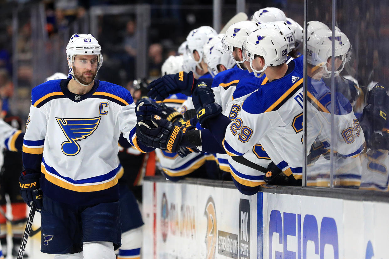 ANAHEIM, CALIFORNIA - MARCH 11:   #27 of the St. Louis Blues is congratulated at the bench after scoring a goal during the first period of a game against the Anaheim Ducks at Honda Center on March 11, 2020 in Anaheim, California. (Photo by Sean M. Haffey/Getty Images)