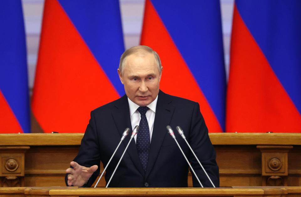 Russian President Vladimir Putin gestures while addresses a meeting of the Council of Legislators under the Russian Federal Assembly at the Tauride Palace, in St. Petersburg, Russia, Wednesday, April 27, 2022. (Alexander Demyanchuk, Sputnik, Kremlin Pool Photo via AP)