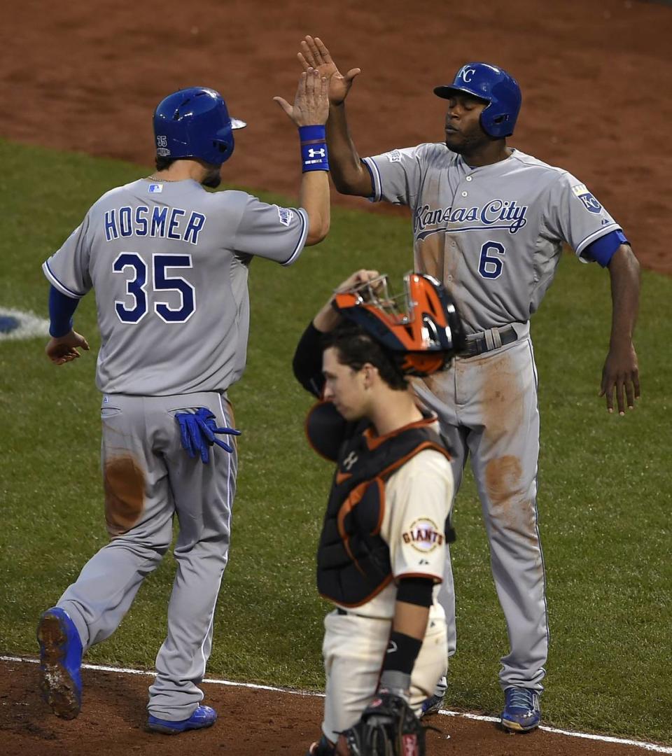 Kansas City Royals first baseman Eric Hosmer (35) and Lorenzo Cain (6) celebrate at the plate as the Royals go up 3-1 in the third inning during Saturday’s Kansas City Royals and San Francisco Giants Game 4 of the World Series at AT&T Park on Oct. 25, 2014 in San Francisco, California.