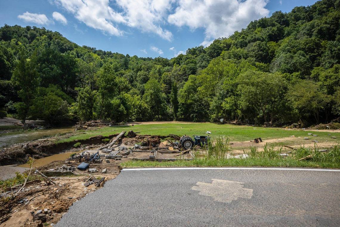 A section of road along KY-3351 by a bridge over Troublesome Creek near Ary in Perry County, Ky., remains damaged Tuesday, Aug. 2, 2022, following flooding last week that devastated many counties in Eastern Kentucky.