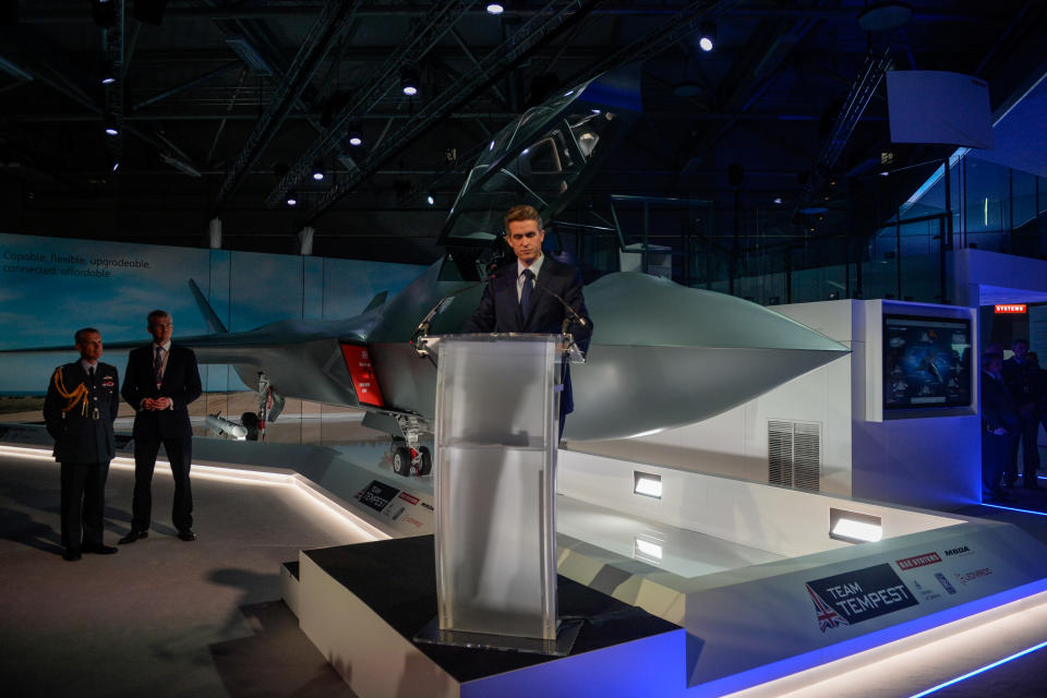 Gavin Williamson, defence secretary, with a model of Tempest, the UK’s new fighter jet unveiled at the Farnbourgh Airshow. Source: Bloomberg/Getty.