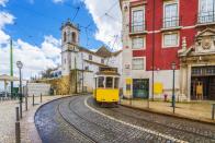 <p>It's the deep dark shades of green and red that make Portugal’s capital Lisbon so well known. Brightly coloured doors, architecture and red-tiled roofs give this sun-drenched city its charming buzz.</p>