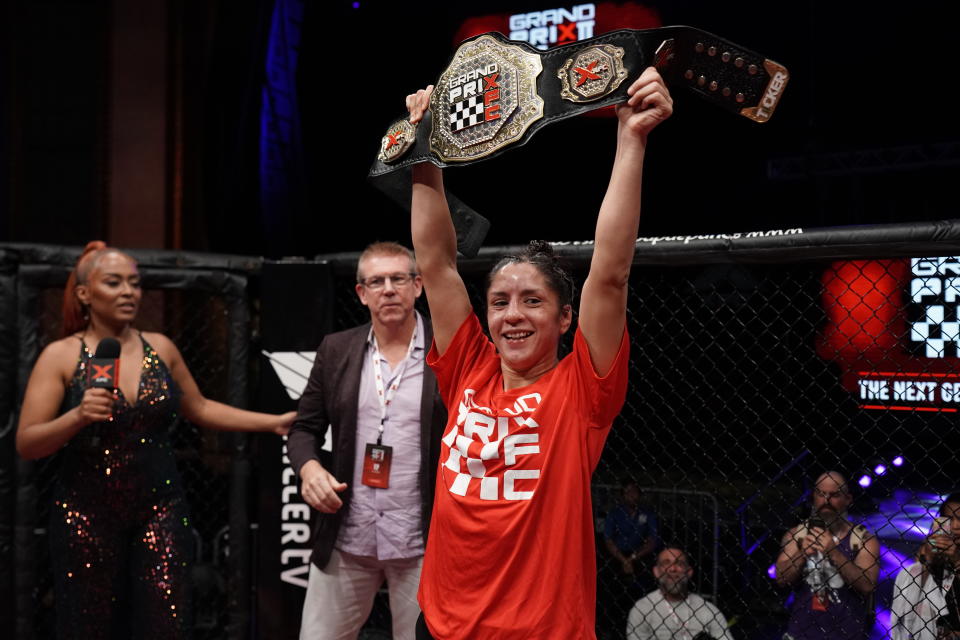 Xtreme One Entertainment Chairman of the Board Jeff Lambert awards Rainn Guerrero Fight of the Night honors following her win at XFC Grand Prix II in Detroit. The Texan improved to 6-2 and gave fans a performance to remember.