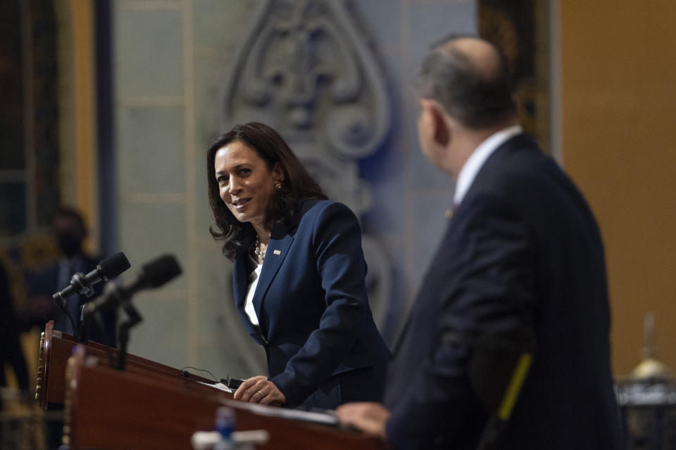 Vice President Kamala Harris, left, looks toward Guatemalan President Alejandro Giammattei, during a news conference, Monday, June 7, 2021, at the National Palace in Guatemala City. (AP Photo/Jacquelyn Martin)