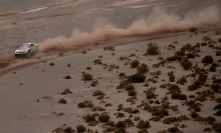 Dakar Rally - 2017 Paraguay-Bolivia-Argentina Dakar rally - 39th Dakar Edition - Fifth stage from Tupiza to Oruro, Bolivia 06/01/17. Cyril Despres of France drives his Peugeot with his copilot David Costera. REUTERS/Ricardo Moraes