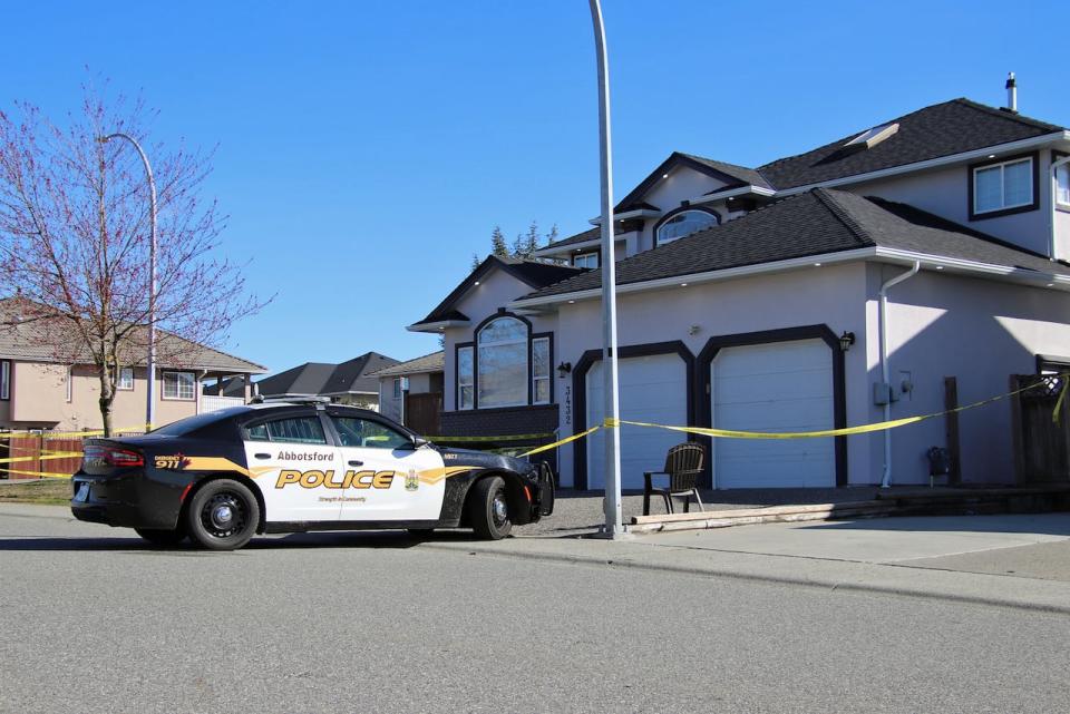 Police in Abbotsford, B.C., say a man has been arrested in the death of a woman after officers responded to a report of an assault at a home in the city Friday night.  (Shane MacKichan - image credit)