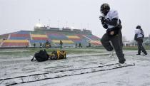 Hamilton Tiger-Cats fullback Dahrran Diedrick goes through drills during a practice, Wednesday November 20, 2013 in Regina. The Tiger-Cats will face the Saskatchewan Roughriders Sunday in the 101st CFL Grey Cup. THE CANADIAN PRESS/Paul Chiasson