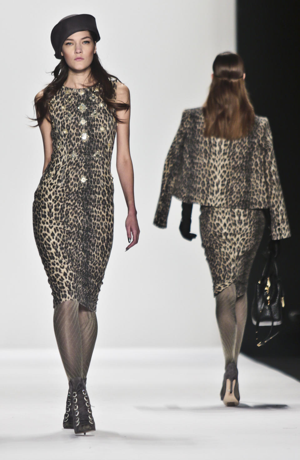 Fashion from the Badgley Mischka Fall 2014 collection is modeled during New York Fashion Week on Tuesday Feb. 11, 2014. (AP Photo/Bebeto Matthews)