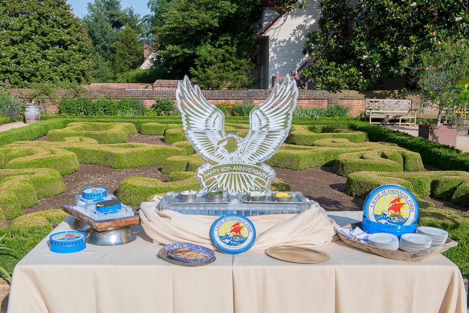 An ice sculpture surrounded by Petrossian caviar at the VIP reception