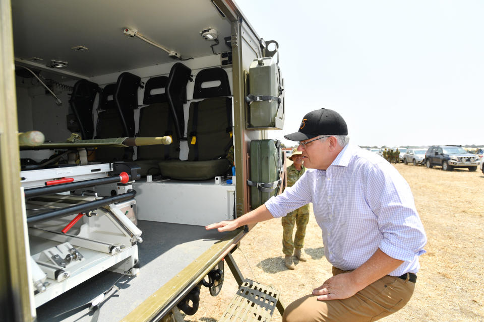 Australian Prime Minister Scott Morrison is seen visiting the Defence Staging Ground at Kingscote Aiport on Kangaroo Island. Source: AAP Image/David Mariuz