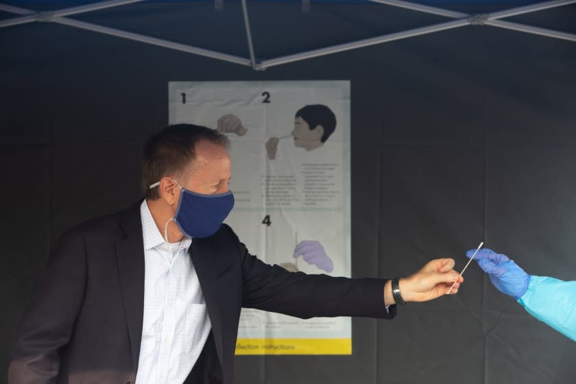 WILMINGTON, CA - SEPTEMBER 14: LAUSD Superintendent Austin Beutner takes a COVID-19 nose swab test at Harry Bridges Span School on Monday, Sept. 14, 2020 in Wilmington, CA. After taking the test, Beutner announced an ambitious testing and contract tracing program as a prelude to getting campuses open. (Gabriella Angotti-Jones / Los Angeles Times)