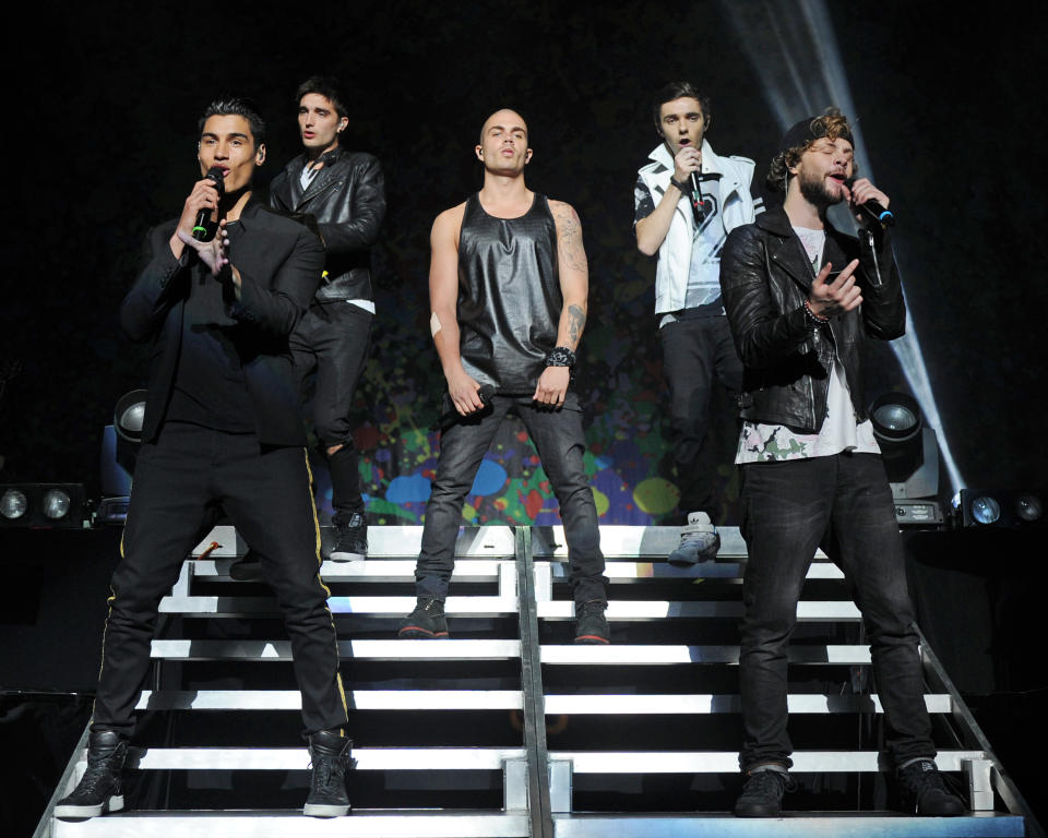 The Wanted performing together on stage (Getty Images)