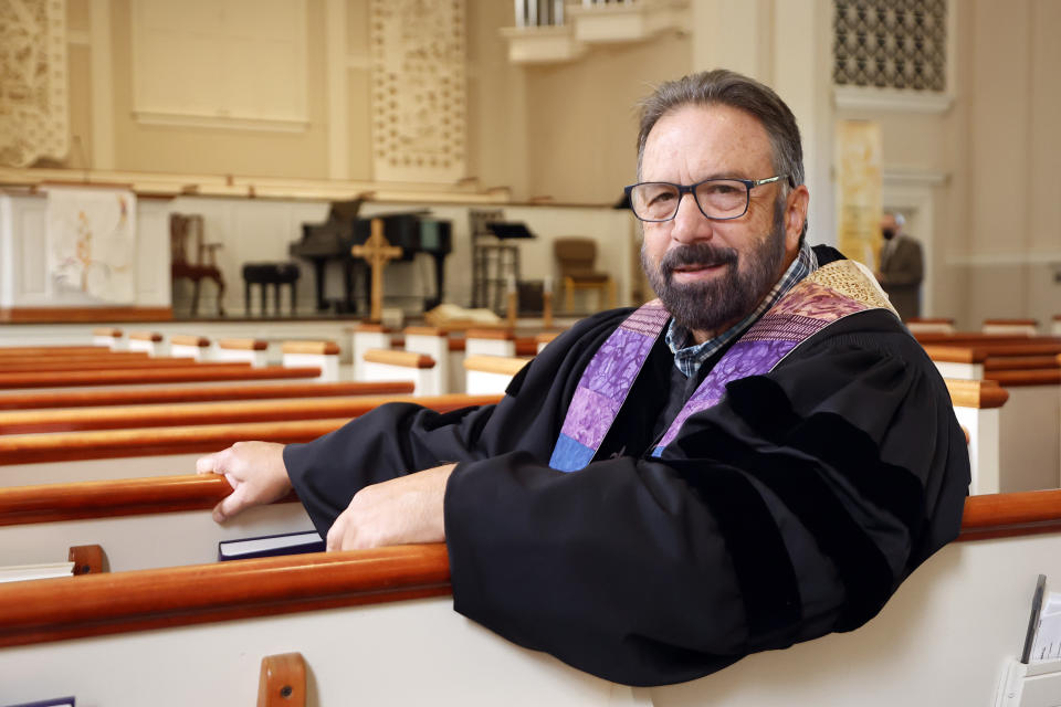 Pastor Mike Usey poses for a portrait sitting in the pews of College Park Baptist Church in Greensboro, N.C., Sunday, Sept. 25, 2022. The College Park church found itself in the news last week when the Southern Baptist Convention's Executive Committee voted to remove it from its rolls because of its “open affirmation, approval and endorsement of homosexual behavior." That action came 23 years after the congregation itself voted to leave the SBC, but according to the Executive Committee, it had remained on its rolls until now.(AP Photo/Karl DeBlaker)