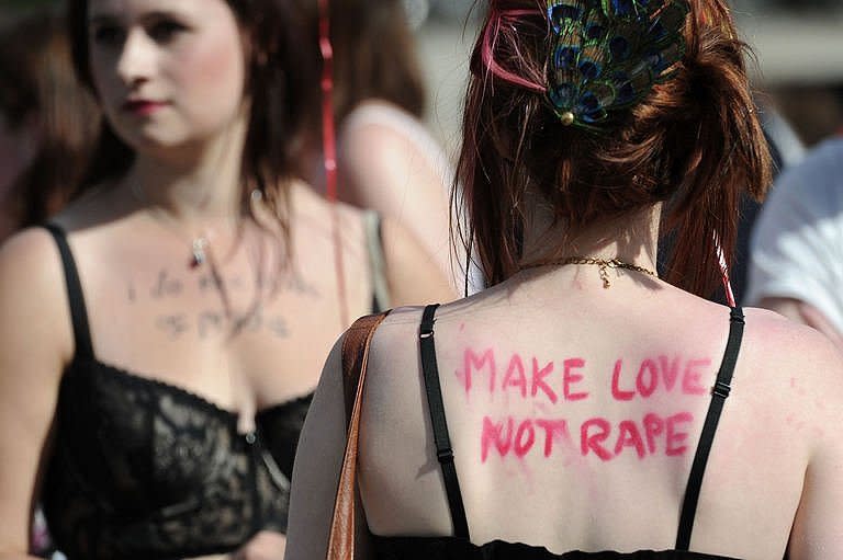 Women take part in a Slut Walk protest in central London